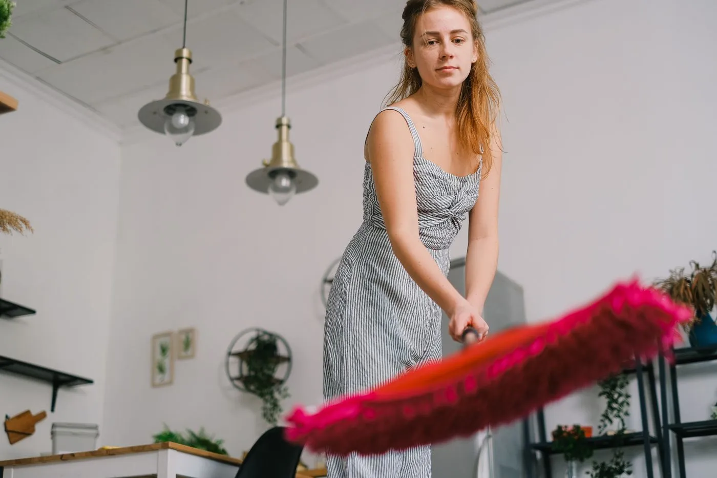 Person preparing to mop a floor at home