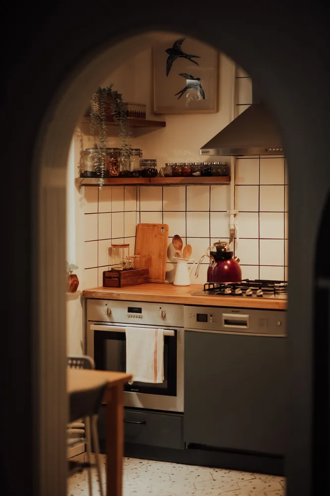 Warm kitchen with appliances and wooden counters