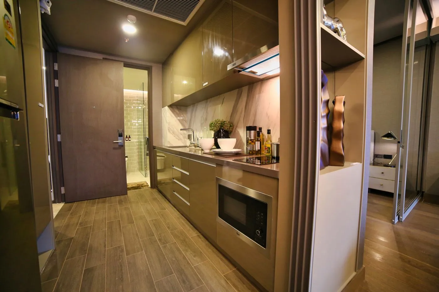 Compact kitchen with appliances and cabinetry